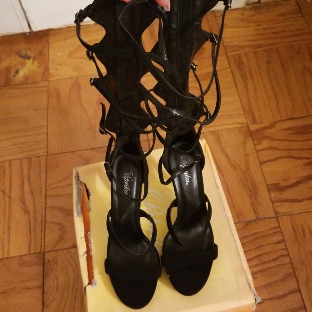 Knee high strappy black heeled sandal